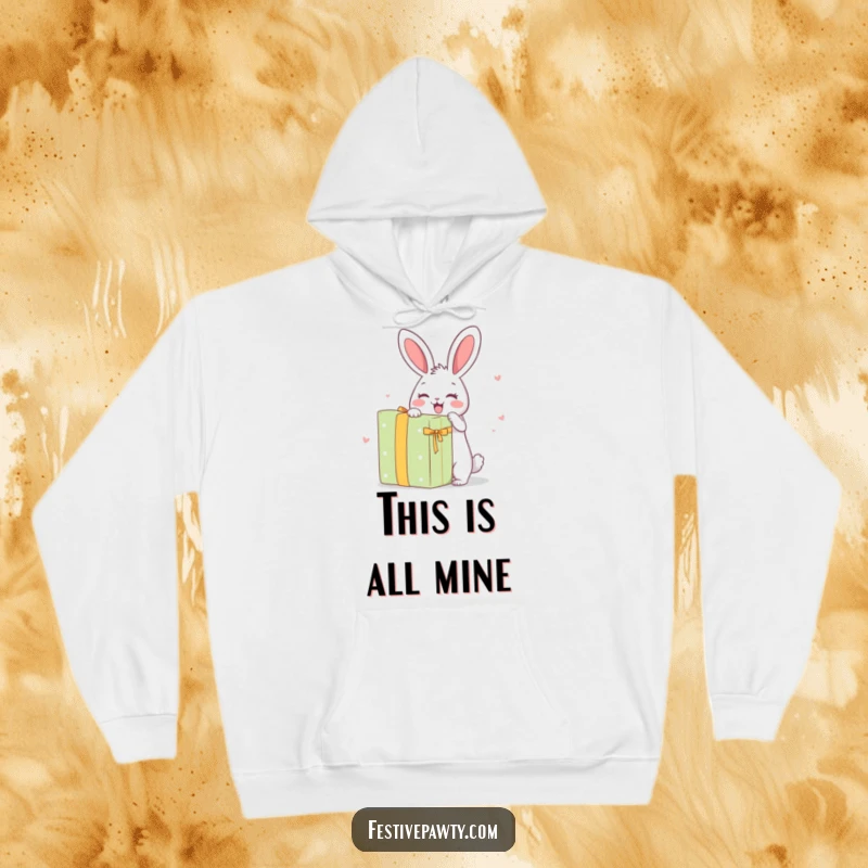 Funny Hoodie: A happy rabbit character in mid-leap, joyfully unwrapping an enormous surprise present.