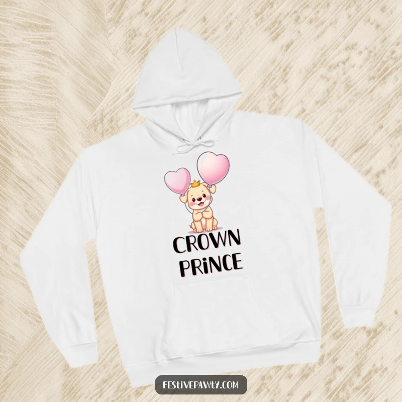 Funny Hoodie showcasing a happy puppy wearing a miniature crown, happily holding a large, shimmering balloon, perfect for cozying up in style.