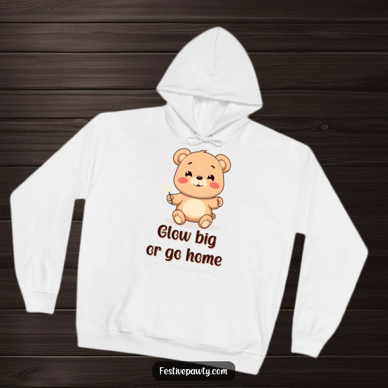 Funny Bear Hoodie, a warm sweatshirt featuring a smiling bear character holding a brightly lit sparkler, perfect for celebrations.