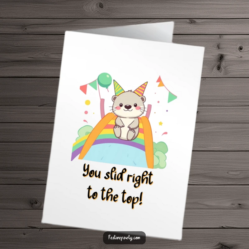 Funny Free Printable Congratulations Card showing a cheerful otter sliding down a rainbow, symbolizing a smooth and fun journey to success.