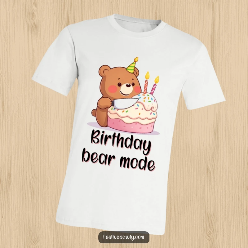 Funny t-shirt featuring a happy bear character beaming with delight as it cuts a huge, festive birthday cake, full of cheer.