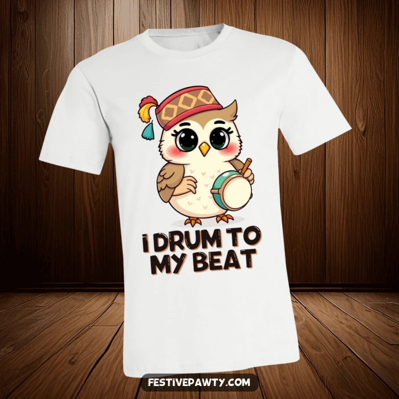 Funny T-Shirt: A smiling owl character wearing a festive fez, energetically playing a miniature drum, celebrating woodland whimsy.