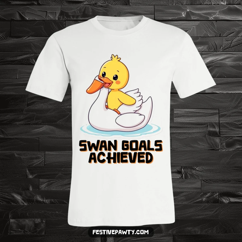 Funny T-Shirt: A happy duck gleefully rides a white inflatable swan, radiating a sense of pure, unadulterated summer joy.