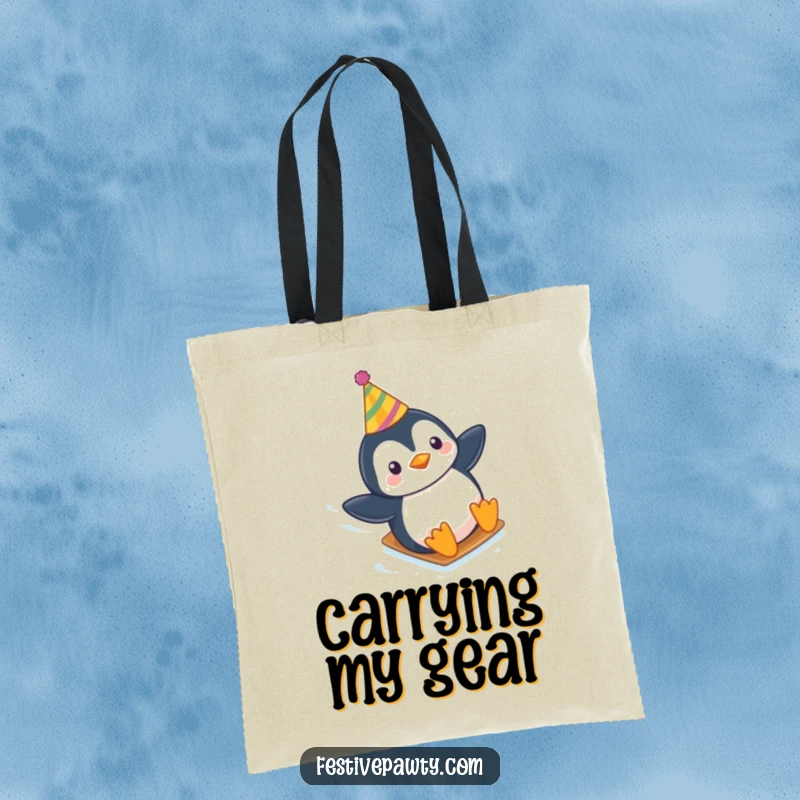 Funny tote bag depicting a festive penguin wearing a party hat, sliding gleefully down an icy slope with energy.